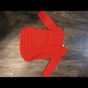 Burnt orange and striped blue blouse